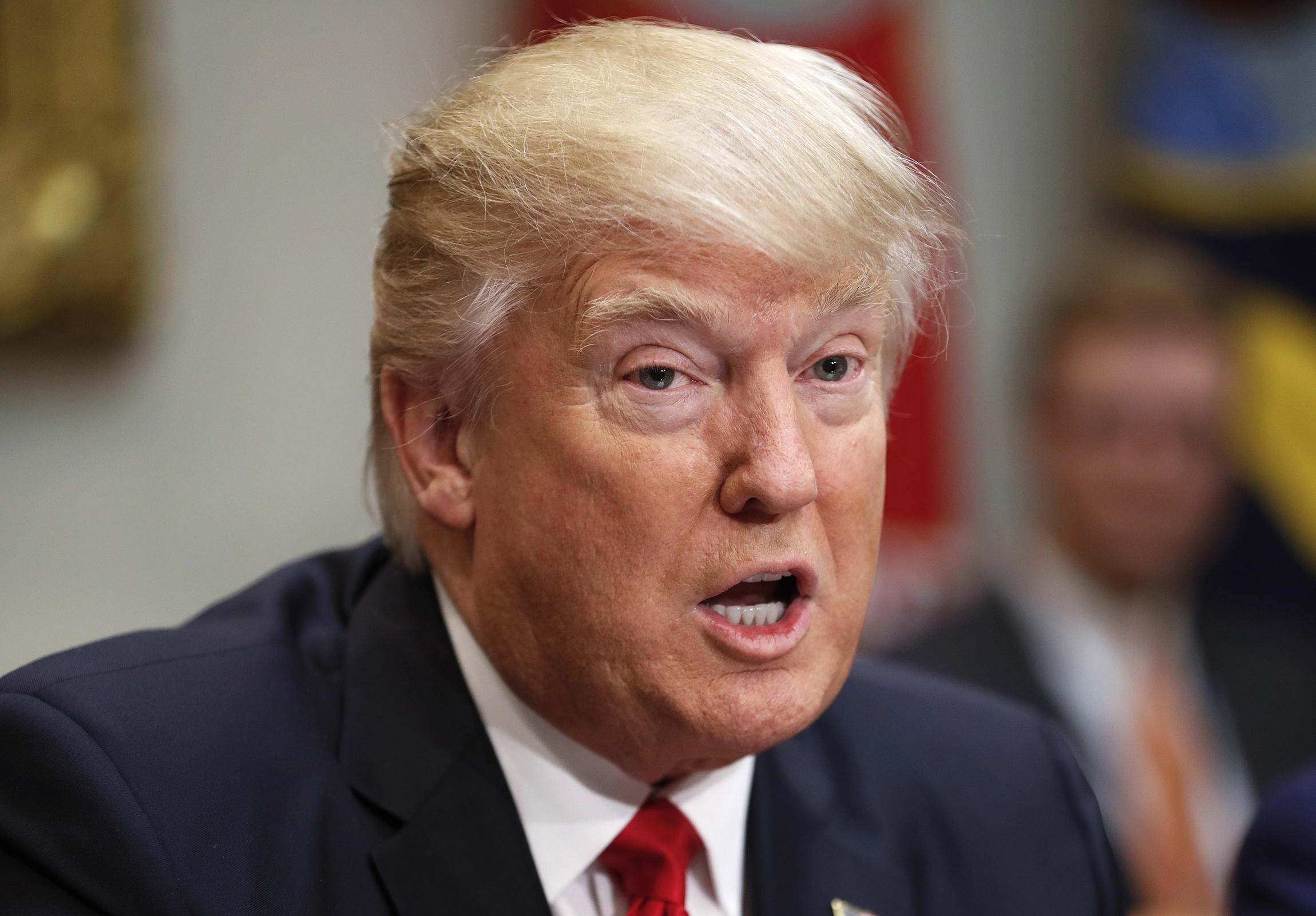 DHS ‘has suspended any and all actions’ implementing Trump’s order