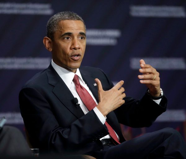 Issues back home trail Obama on Latin America trip