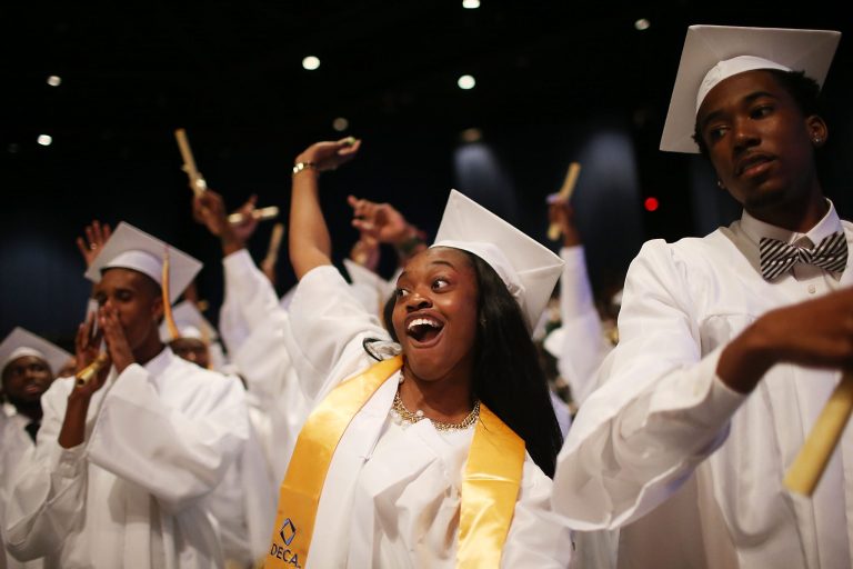 McDonogh #35 Senior High School graduates celebrate at their commencement at the Ernest N. Morial Convention Center on May 14, 2015 in New Orleans, Louisiana. It is one of the last remaining traditional public schools in the city. (Photo by Mario Tama/Getty Images)
