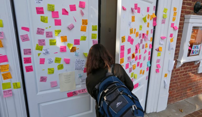 A student walks into Peabody Hall, the undergraduate admissions building at the University of Virginia in Charlottesville, Va., Monday, Nov. 24, 2014. (AP Photo)Â 