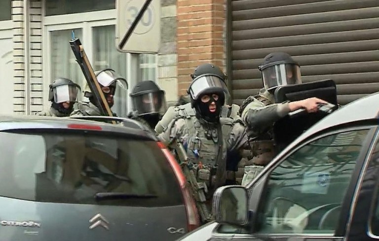 Salah Abdeslam was arrested on Friday in Brussels, according to French officials, after investigators found his fingerprints during a raid on an apartment earlier this week. (VTM via AP)