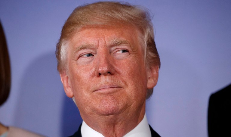 In face-to-face briefings with congressional staff, according to those sources, FBI and DOJ officials have said they cannot verify the dossier's charges of a conspiracy between the Russian government and the Trump campaign. (AP Photo/Evan Vucci)