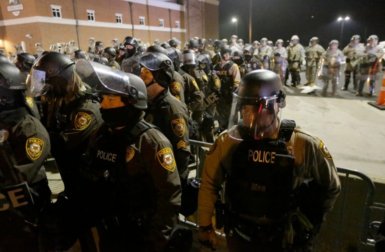 Ferguson City Council approved the first reading of a measure that would reverse the government's lawsuit. (AP Photo/Charlie Riedel)
