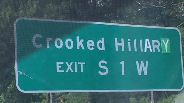 Freeway exit sign defaced to read ‘Crooked Hillary’