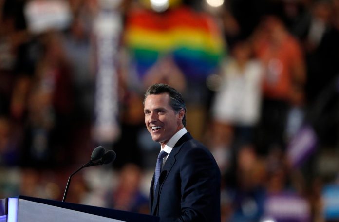 Newsom's conflation is an important mistake that elides a crucial distinction. (AP Photo/Paul Sancya)