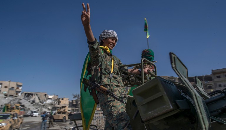 Militia women Thursday held a celebration in a liberated Raqqa, Syria after four years of occupation by the ISIS terrorist group, which had seen the city as the center of its global caliphate. (AP Photo/Gabriel Chaim)
