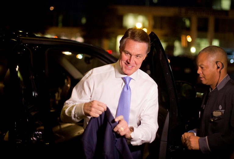 Georgia Republican U.S. Senate candidate David Perdue arrives for his election night party, Tuesday, Nov. 4, 2014, in Atlanta. (AP Photo/David Goldman)