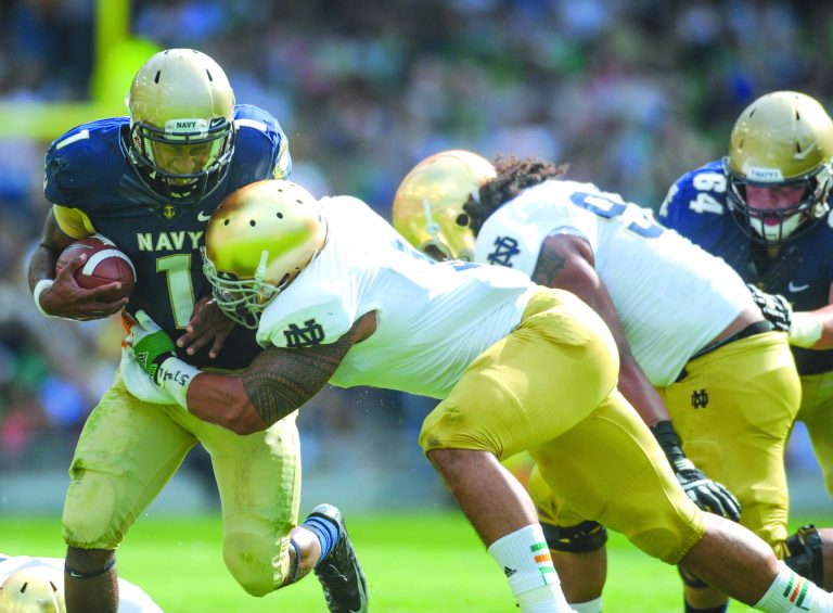 Barry Cronin/Getty Images
Navy quarterback Trey Miller ran for just 16 yards on 20 carries as the Irish forced the Mids to abandon their running game.