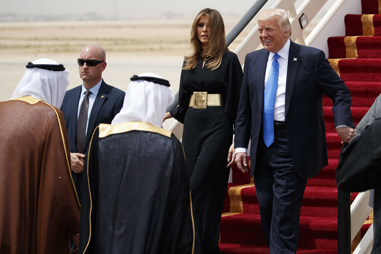 Trump rolls by Toby Keith concert in a golf cart with Saudi King Salman