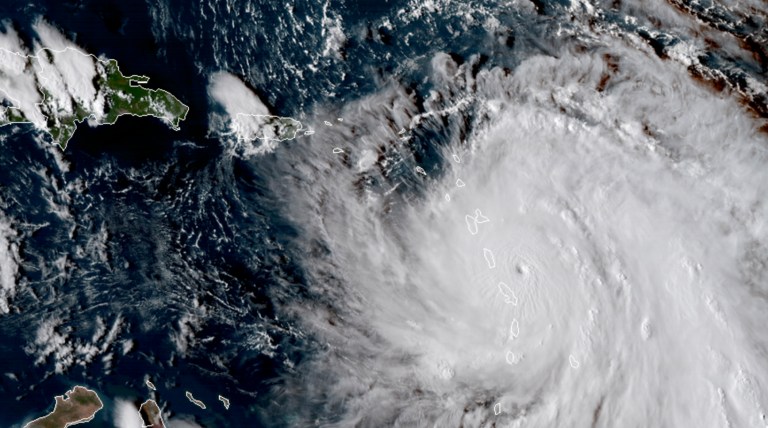 GOES East satellite image provided by NASA shows the eye of Hurricane Maria as it nears Dominica. Maria make landfall over the island Monday evening, according to the National Hurricane Center. (NASA via AP)