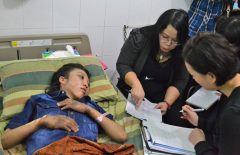 Hong Kong police question maid abuse victim