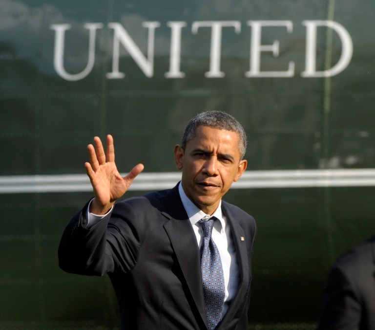 President Barack Obama walks from Marine One on the South Lawn of the White House in Washington, Wednesday, Aug. 1, 2012, after returning from campaigning in Ohio. (AP Photo/Susan Walsh)