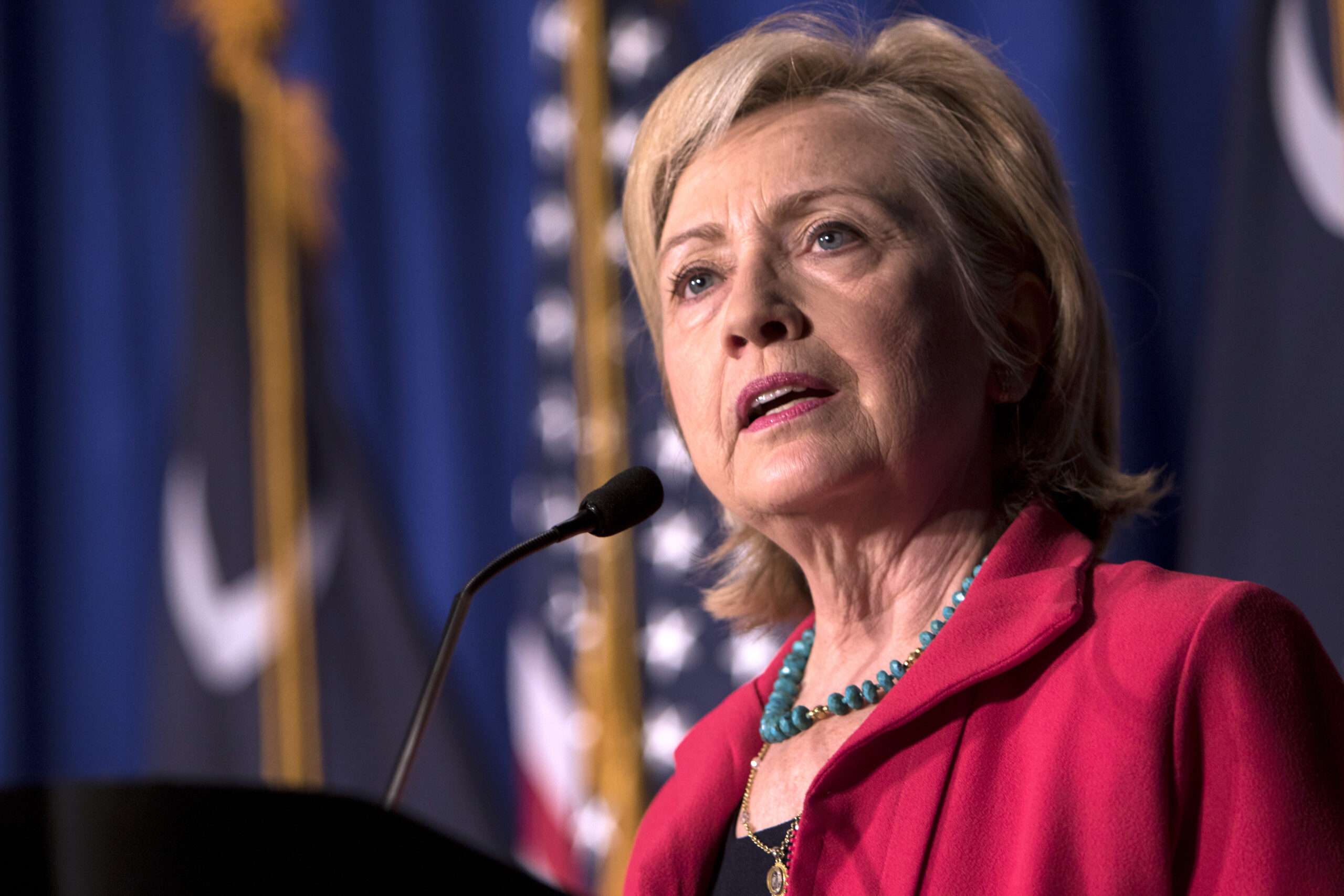 Clinton calls for repeal of Cadillac tax