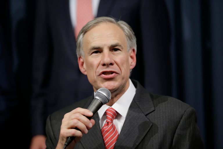 Texas Attorney General Greg Abbott speaks during a news conference with Gov. Rick Perry in Austin in July. (AP Photo/Eric Gay)