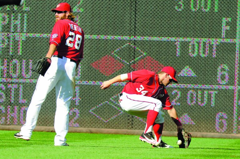 Greg Fiume/Getty Images
Bryce Harper, right, and Jayson Werth both dropped fly balls Sunday, helping the Brewers beat the Nationals.