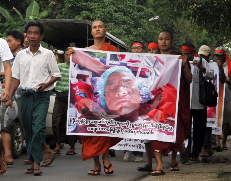   Buddhist monks march towards the Chinese Embassy during a protest against a violent crackdown on monks by Myanmar police at Letpadaung copper mine in Monywa, northwest Myanmar, Saturday, Dec. 1, 2012 in Yangon, Myanmar. The mine is a joint venture between China's Wanbao Mining Copper Ltd. and the military-owned Union of Myanmar Economic Holdings Ltd. Many in Myanmar remain suspicious of the military and see China as an aggressive and exploitive investor that helped support its rule. (AP Photo/Khin Maung Win)  