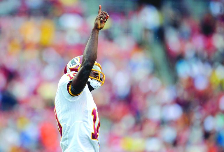 Nick Wass/AP
Robert Griffin III led the Redskins on two touchdown drives in the first half in a preseason victory over the Colts on Saturday.