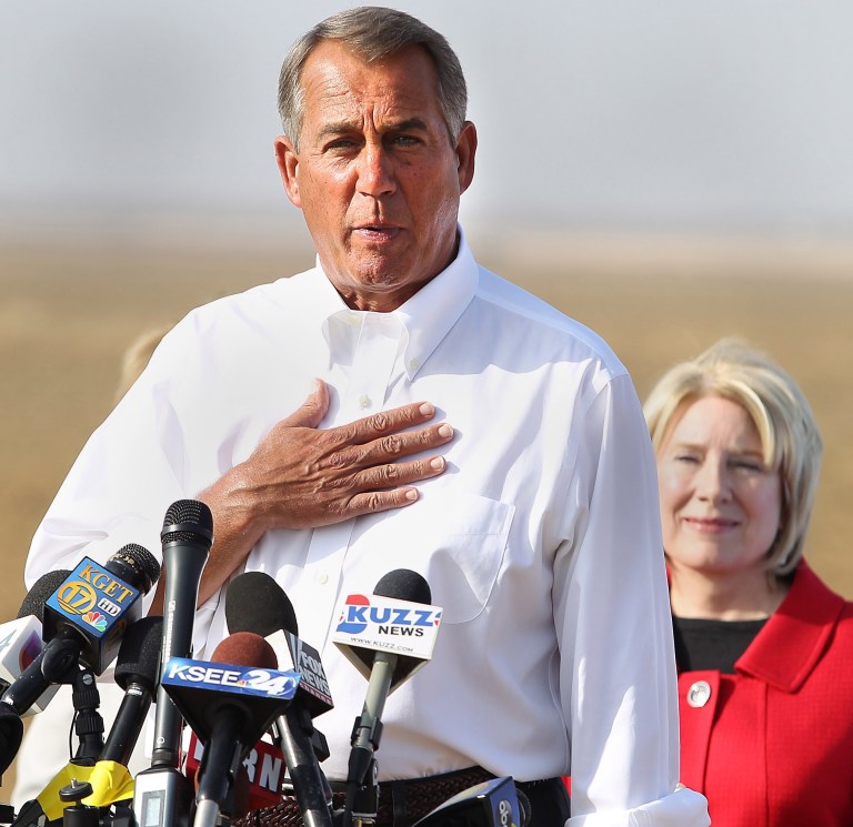 House Speaker John Boehner talks about the drought in the Central Valley, Wednesday, Jan. 22, 2014, during a news conference on farmer Larry Starrh's land, northwest of Bakersfield, Calif. State Sen. Jean Fuller is behind him. Boehner visited a dusty California field, joining Central Valley Republicans to announce an emergency drought-relief bill to help farmers through what is certain to be a devastating year. If passed, the bill that's already stirring controversy would temporarily halt restoration of the San Joaquin River designed to bring back the historic salmon flow, among other measures. Farmers want that water diverted to their crops. (AP photo/The Bakersfield Californian, Casey Christie) MAGS OUT  ONLINES OUT  TV OUT  NO SALES