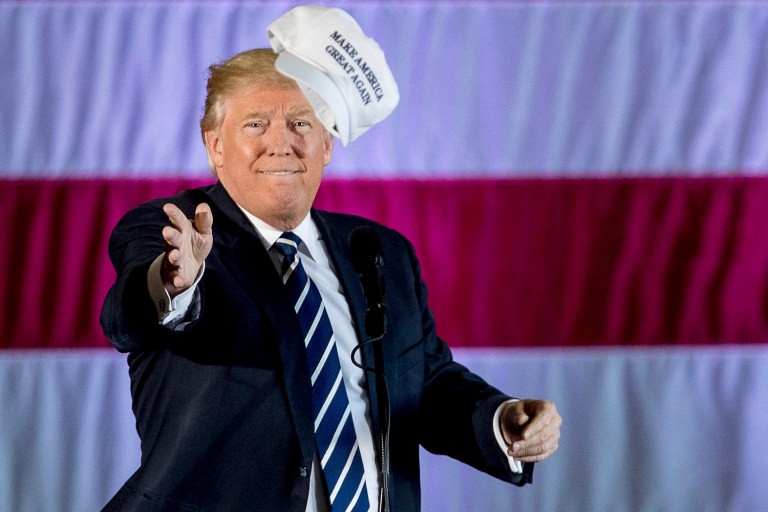 Trump, a career showman who loves putting his name on things, is in danger of falling into the Santa trap. (AP Photo/Andrew Harnik)