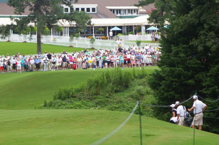  Even after a storm delayed the first round for nearly two hours, the 10th tee was loaded with fans on Thursday, part of a first-round record crowd at the Kingsmill Championship / Photo by Kevin Dunleavy 