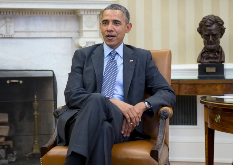 President Barack Obama meets with faith leaders in the Oval Office of the White House in Washington, Tuesday, April 15, 2014. (AP Photo/Carolyn Kaster)