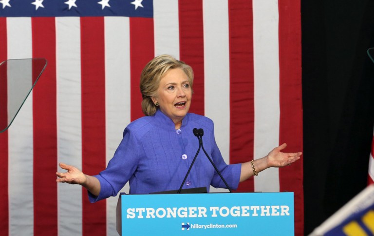 Hillary Clinton is planning to propose corporate tax reform, but the specifics won't come until after the election, a campaign adviser said. (Patrick Farrell/Miami Herald via AP)