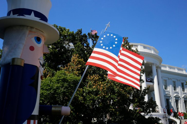 Weather forces White House to scrap a planned South Lawn barbecue. (AP Photo/Charles Dharapak)