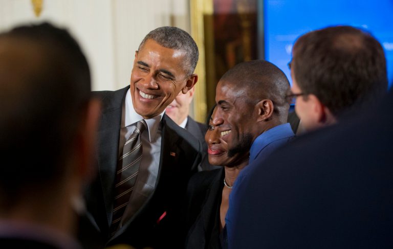 President Obama stops to pose for a photograph with Terrence Wise, right, and Wise's mom Joann Wise, center, during the White House Summit on Worker Voice, Wednesday, Oct. 7, 2015, in the East Room of the White House in Washington. (AP Photo/Pablo Martinez Monsivais)