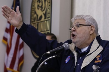 Jeffrey David Cox Sr., American Federation of Government Employees (AFGE) International President, speaks to local union members prior to joining representatives and Massachusetts labor leaders to  walk, knock and talk  campaign to help Massachusetts Democratic candidate  Elizabeth Warren in her bid for the U.S. Senate, Nov. 3, 2012, in Boston's Roslindale neighborhood. (Bizuayehu Tesfaye/AP Images for American Federation of Government Employees)