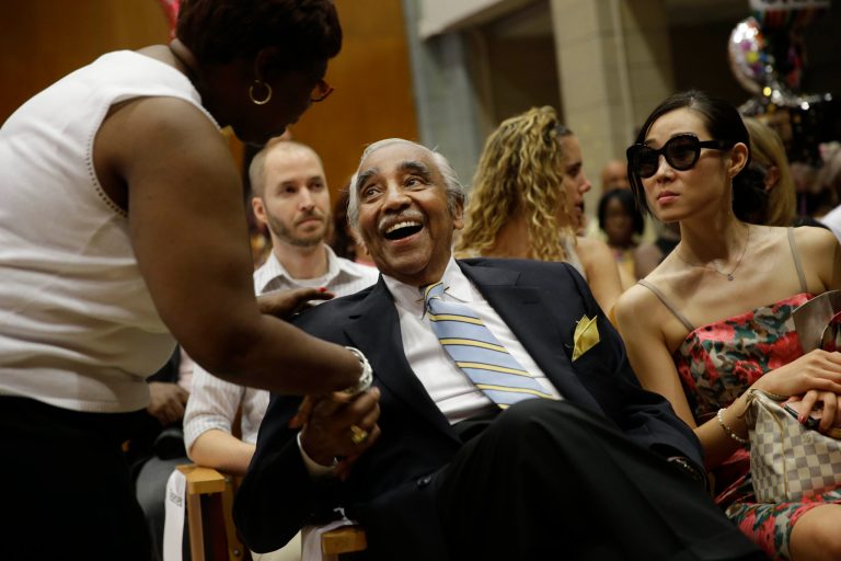Congressman Charles Rangel greets a supporter before a graduation ceremony in New York, Monday, June 23, 2014. Rangel faces off with a state lawmaker and a Harlem minister in the tightly contested Democratic primary in the 13th Congressional District, the biggest race in New York's primary on Tuesday. (AP Photo/Seth Wenig)