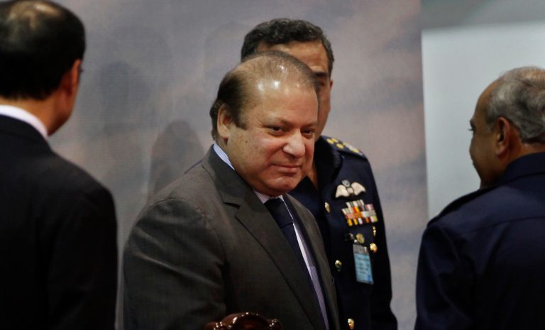 In this Wednesday, Dec. 18, 2013 photo, Pakistan's Prime Minister Nawaz Sharif attends a ceremony at Aeronautical Complex in Kamra, near Islamabad, Pakistan. Sherif said on Wednesday, Jan. 29, 2014, his government will pursue peace talks with militants despite a recent spate of attacks, naming a four-member committee to facilitate the talks. (AP Photo/Anjum Naveed)
