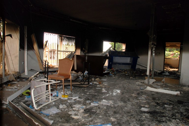 Glass, debris and overturned furniture are strewn inside a room in the gutted U.S. consulate in Benghazi, Libya, after an attack that killed four Americans in September 2012. (AP Photo/Ibrahim Alaguri)
