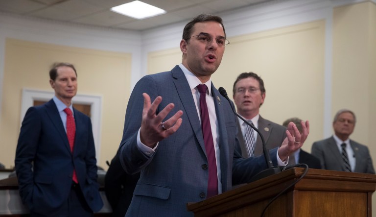 Several Republicans who have tried to limit FISA's potential for domestic surveillance, like Rep. Justin Amash of Michigan (pictured center), have split with Democrats over the memo. (AP Photo/J. Scott Applewhite)