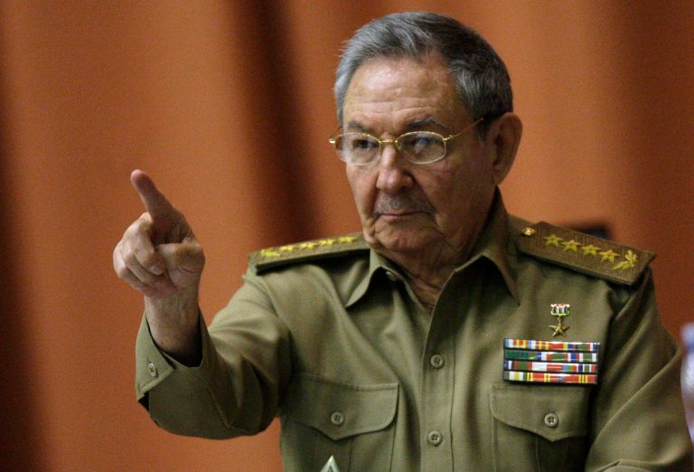   Cuba's President Raul Castro points as he attends a session of the National Assembly in Havana, Cuba, Thursday, Dec. 13, 2012. The session is one of the National Assembly's twice-yearly gatherings. (AP Photo/Ismael Francisco, Cubadebate)  