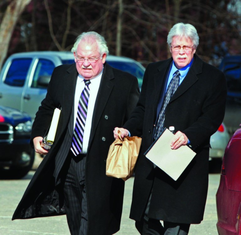 Mark Strong and his attorney Daniel Lilley enter York County Superior Court in Alfred, Maine, after returning from a lunch break on Tuesday, Jan. 22, 2013. Jury selection began Tuesday for Strong's trial accusing him of conspiring with Zumba instructor Alexis Wright to run a one-woman prostitution business in Kennebunk. Strong has pled not guilty to 59 misdemeanors. (AP Photo/Portland Press Herald, Gregorey Rec)