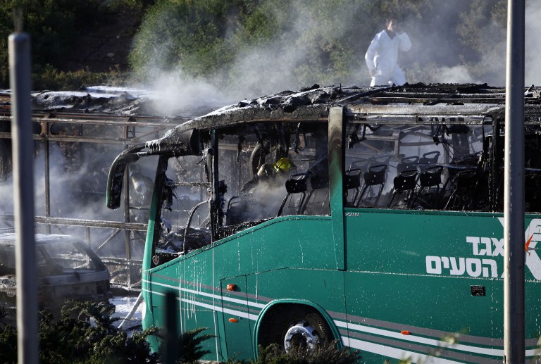 Police say the device exploded in the back half of the bus. (AP Photo/Mahmoud Illean)