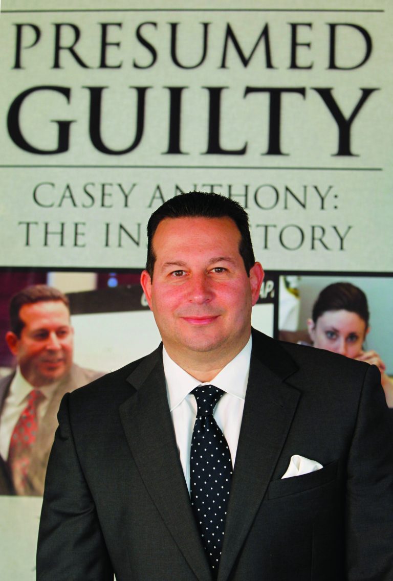 In this Tuesday, July 3, 2012 photo, Casey Anthony's defense attorney, Jose Baez, poses for a photo during an interview with The Associated Press in Coral Gables, Fla. In his just-published book 