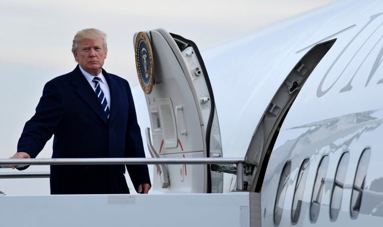 President Donald Trump walks up the steps of Air Force One at John F. Kennedy International Airport in New York, Saturday, Dec. 2, 2017. Trump spent the day in New York attending a trio of fundraisers. (AP Photo/Susan Walsh)