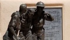 While a town remembers World War II veterans, atheists sue to stop it