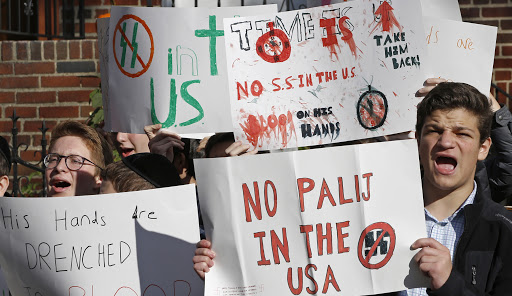 High school students from the Orthodox Jewish Rambam Mesivta school protest across the street from the home of Jakiw Palij, 94, a former Nazi concentration camp guard whose citizenship has been revoked, but hasn't been deported on Nov. 9, 2017, in the Jackson Heights neighborhood of New York. Palij was a guard at the Trawniki concentration camp in Nazi-occupied Poland in 1943. He has said he was forced to be a guard. New York's legislators have urged the federal government to deport him.