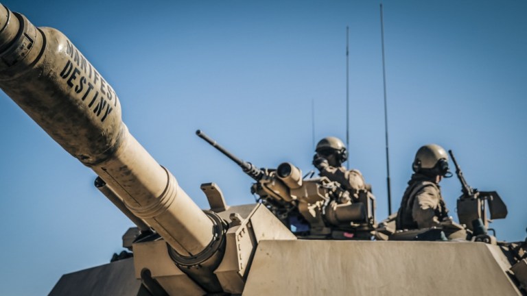 Marines with Battalion Landing Team 3rd Battalion, 5th Marine Regiment, 11th Marine Expeditionary Unit, operate an M1A1 Abrams Main Battle Tank on a live fire range during a predeployment training exercise at Marine Corps Air Ground Combat Center Twentynine Palms, Calif., Nov. 9, 2018. 
