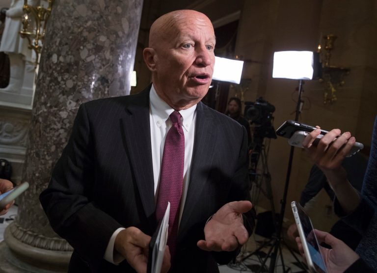 House Ways and Means Committee Chairman Kevin Brady, R-Texas, whose panel is charged with writing tax law, pauses for reporters just after the House gave a significant boost to President Donald Trump's promise to cut taxes, narrowly passing a GOP budget that shelves longstanding concern over federal deficits in favor of a rewrite of the tax code, on Capitol Hill in Washington, Thursday, Oct. 26, 2017. (AP Photo/J. Scott Applewhite)