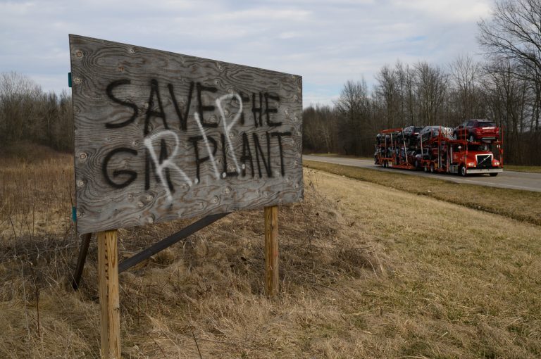 A sign with âSave the GM Plantâ is painted over with âRIPâ along a road near the shuttered GM Lordstown plant in Ohio.  