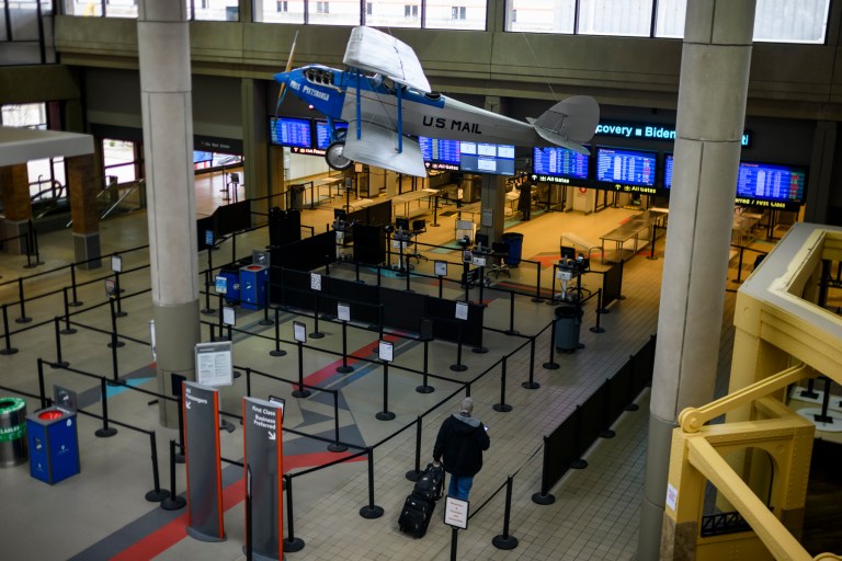 A man walks through a TSA check point before boarding a flight out of Pittsburgh International Airport on April 10. 