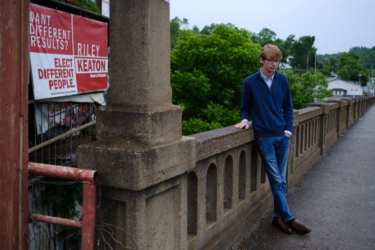 Riley Keaton, 22, of Spencer, West Virginia, poses for a portrait in front of his campaign sign on June 17 â a week after winning the primaries.