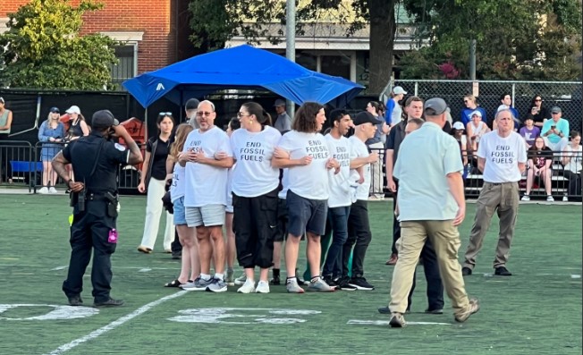 Climate change protesters temporarily disrupt Congressional Women’s Softball Game