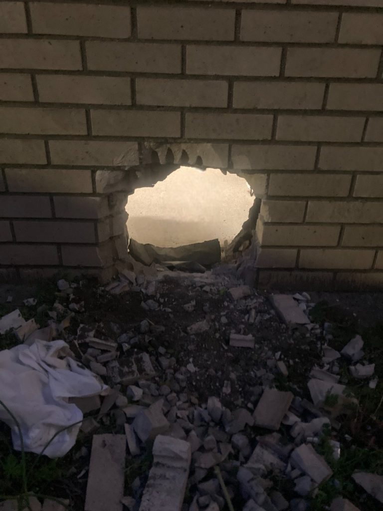 2023-hole-in-jail-annex-wall-768x1024.jpg