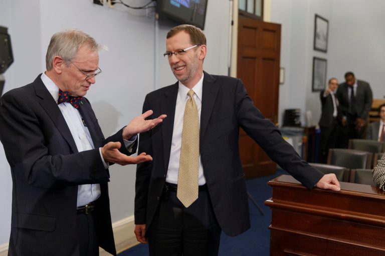 Congressional Budget Office (CBO) Director Douglas Elmendorf, right, talks with House Budget Committee member Rep. Earl Blumenauer, D-Ore. on Capitol Hill in Washington, Wednesday, Feb. 5, 2014, prior to Elmendorf testifying before the committee's hearing on the CBO budget and economic outlook.   (AP Photo/J. Scott Applewhite)