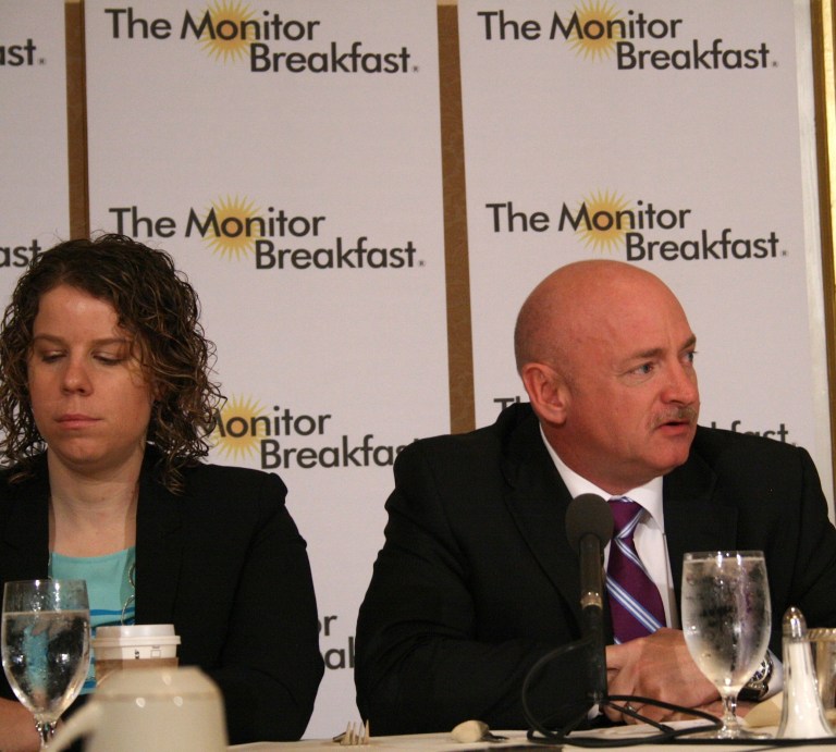 Mark Kelly, co-founder of Americans for Responsible Solutions, with ARS executive director Pia Carusone. 
(Kateland Oakes/The Christian Science Monitor)
