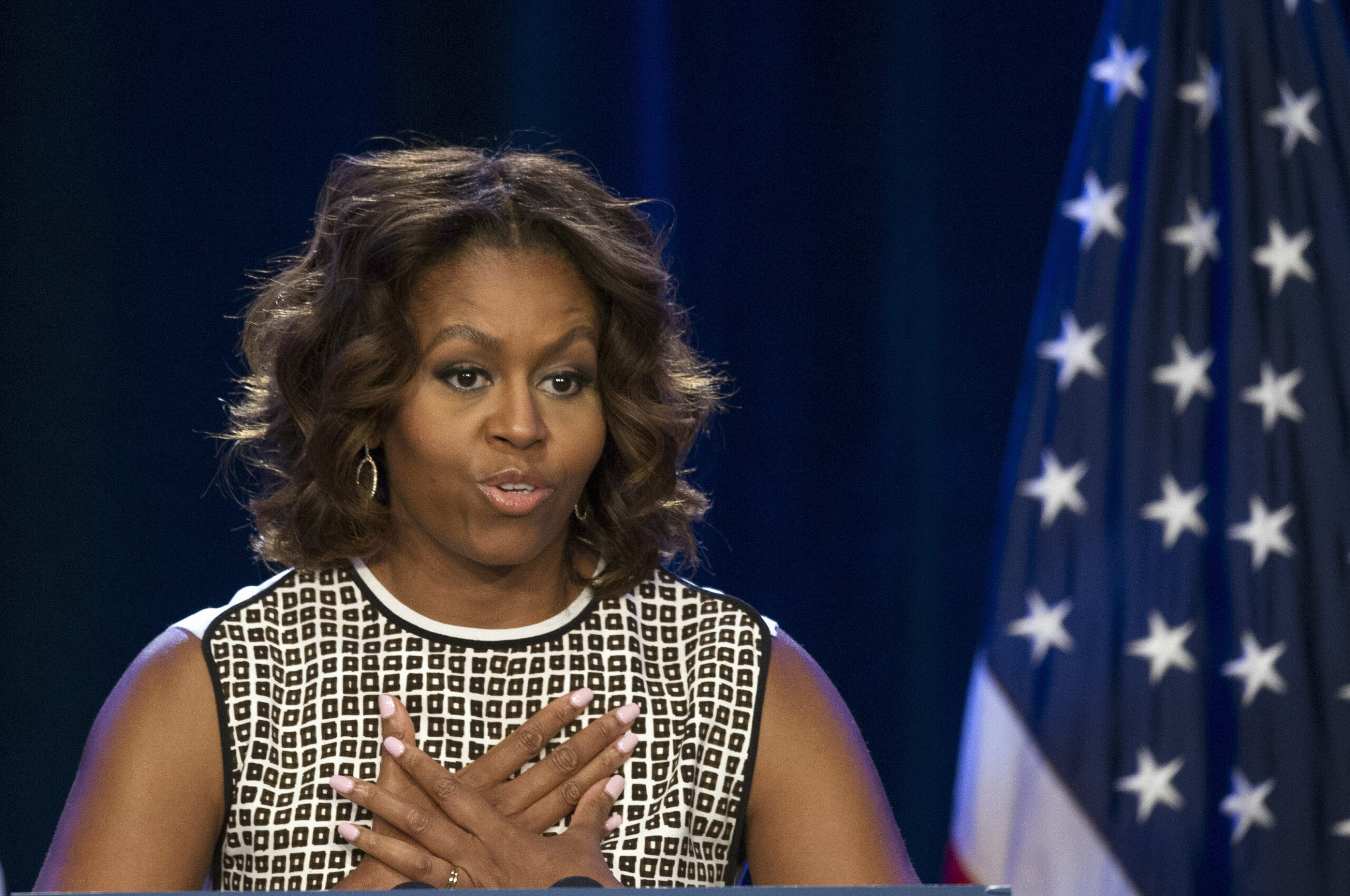 Michelle Obama encourages graduates to channel their anger to change history